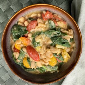 white beans with tomatoes and greens