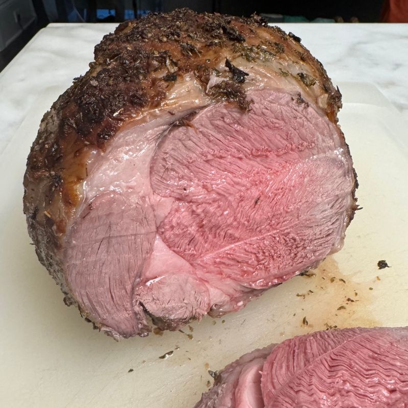 Sliced roasted leg of lamb