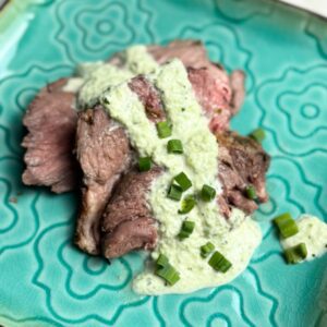 Roasted leg of lamb with yogurt sauce plated