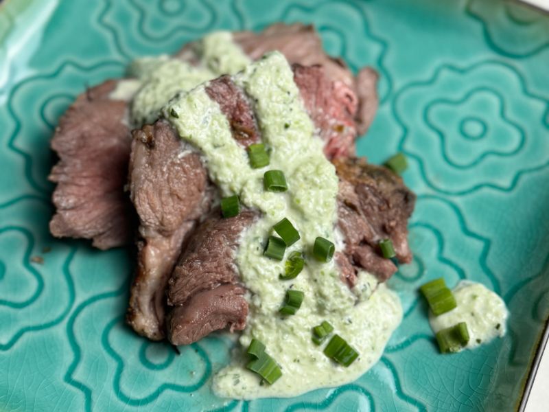 Roasted leg of lamb with. yogurt mint sauce