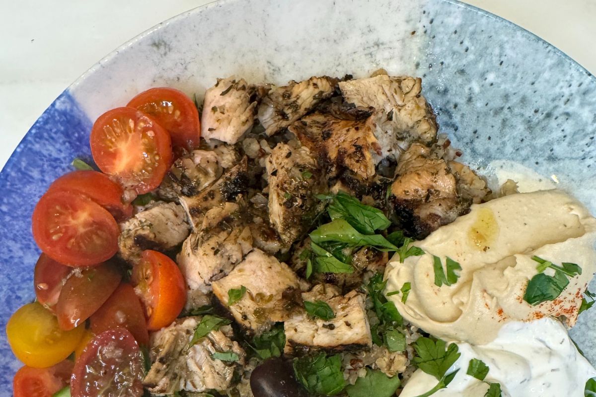 Greek chicken plated with other toppings