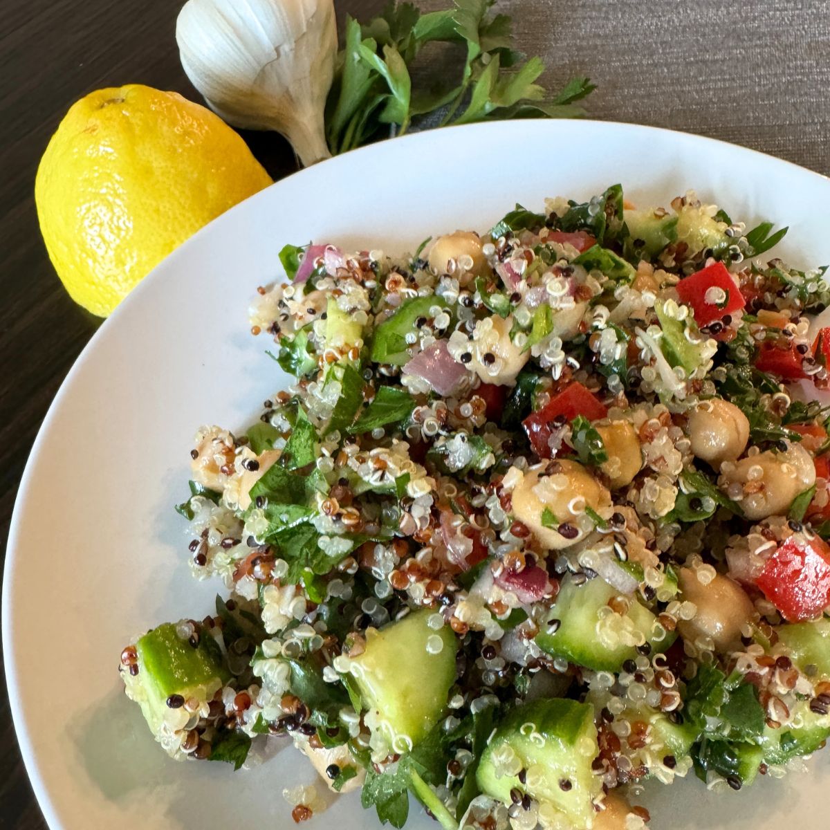 One serving of Chickpea Quinoa Kale Salad plated