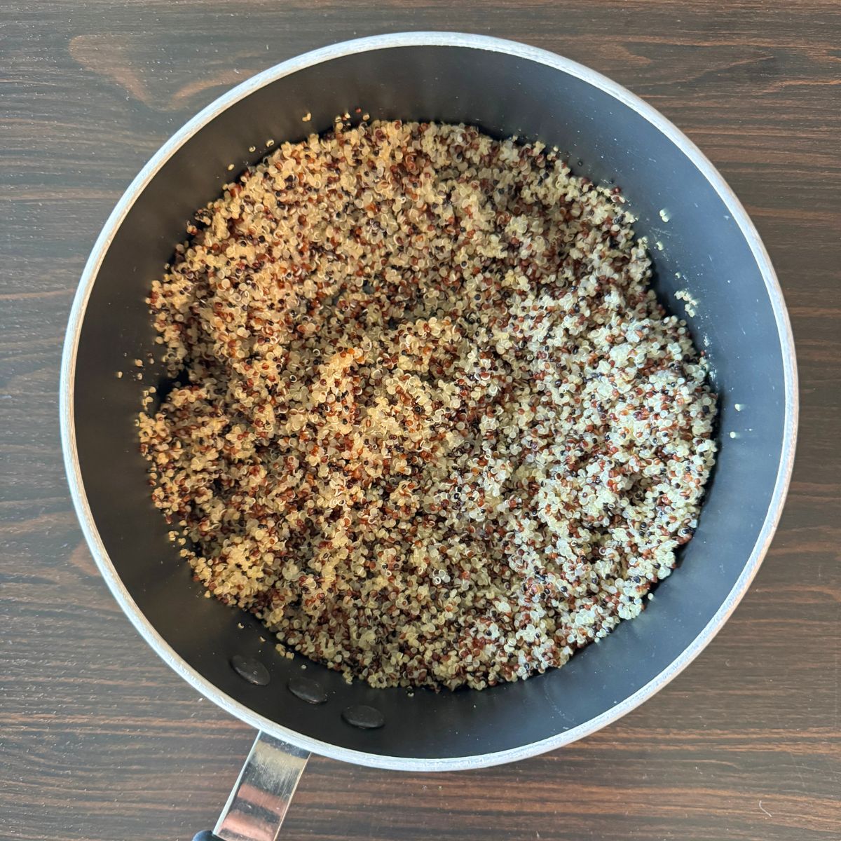 Cooked quinoa in pan